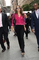 Elizabeth Hurley Lights ESB In Honor Of Breast Cancer Awareness - NYC