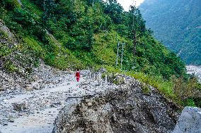 Kulekhani River Flood Damages Dakshinkali-Sisneri Road In Makwanpur, Nepal.