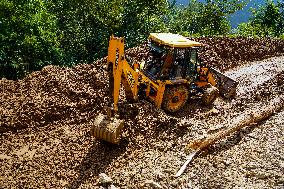 Kulekhani River Flood Damages Dakshinkali-Sisneri Road In Makwanpur, Nepal.