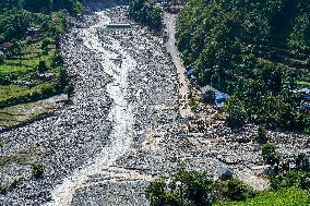 Kulekhani River Flood Damages Dakshinkali-Sisneri Road In Makwanpur, Nepal.