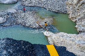 Kulekhani River Flood Damages Dakshinkali-Sisneri Road In Makwanpur, Nepal.