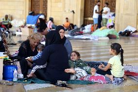 Thousands Sleep Outdoors In Beirut Flee As Israeli Strikes