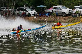 Rider Compete During The Annual ''Sword-Headed Boat Racing Festival