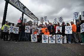 Longshoremen Demonstrate Outside Of Red Hook Terminal In Brooklyn New York As Port Strike Goes Into Day Two