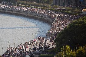 Tourists Visit The Bund Tourist Area in Shanghai