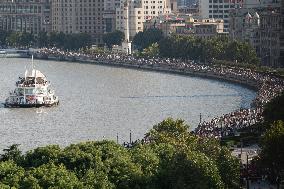 Tourists Visit The Bund Tourist Area in Shanghai