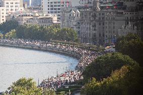 Tourists Visit The Bund Tourist Area in Shanghai