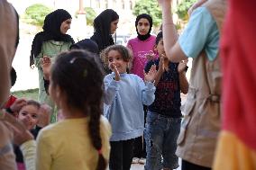 Lebanese take refuge at a monastery in Syria