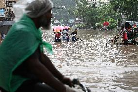 Waterlogged Streets Caused Heavy Rainfall In Dhaka.