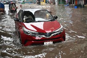 Waterlogged Streets Caused Heavy Rainfall In Dhaka.