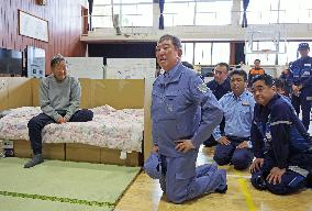 Japan PM visits flood-hit central Japan city