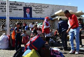 Around 100,000 Lebanese Cross Border Into Syria