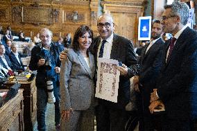 Medal Ceremony for officials involved in the organisation of the Paris 2024 Olympic Games - Paris