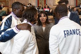 Medal Ceremony for officials involved in the organisation of the Paris 2024 Olympic Games - Paris