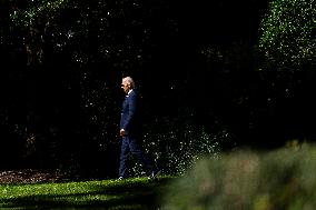 President Joe Biden departs the White House