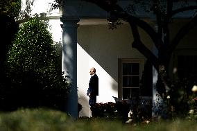 President Joe Biden departs the White House