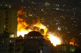 Blasts seen in Dahiyeh as Israel strikes Beirut