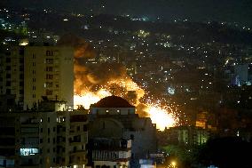 Blasts seen in Dahiyeh as Israel strikes Beirut