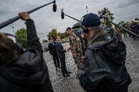 Emmanuel Macron visits a military camp