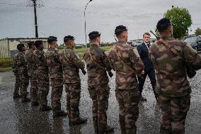 Emmanuel Macron visits a military camp