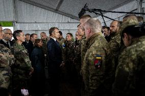 Emmanuel Macron visits a military camp