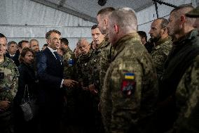 Emmanuel Macron visits a military camp