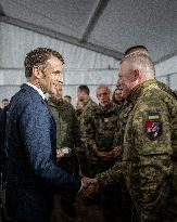 Emmanuel Macron visits a military camp