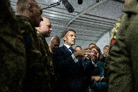 Emmanuel Macron visits a military camp