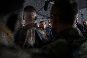 Emmanuel Macron visits a military camp