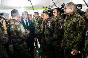 Emmanuel Macron visits a military camp