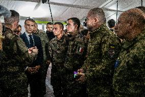 Emmanuel Macron visits a military camp