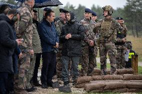 Emmanuel Macron visits a military camp