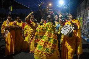 Devotees Performing Nabapatrika Ritual On The Occasion Of The Durga Puja Festival In Kolkata, India