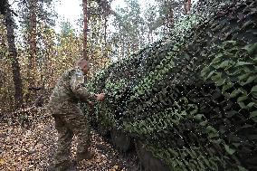 Ukrainian artillery crew at positions in Kharkiv region