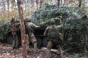 Ukrainian artillery crew at positions in Kharkiv region