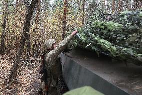 Ukrainian artillery crew at positions in Kharkiv region