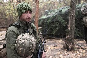 Ukrainian artillery crew at positions in Kharkiv region