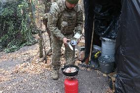 Ukrainian artillery crew at positions in Kharkiv region