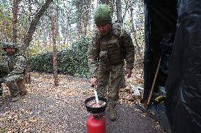 Ukrainian artillery crew at positions in Kharkiv region