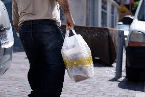 Bags And Boxes Carried By Immigrants, Ready To Be Filled With Food - Beirut