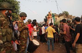 Hindu Devotees Carry An Idol Of Hindu Goddess Durga