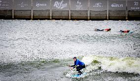 People Surfing In The Center Of Rotterdam