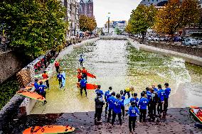 People Surfing In The Center Of Rotterdam