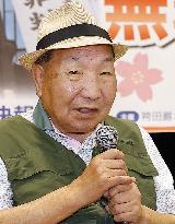 Hakamata speaks in public