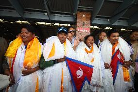 Record Holding Climbers “Nima Rinji Sherpa” And “Dawa Yangzum Sherpa” Return To Heroic Welcome In Nepal