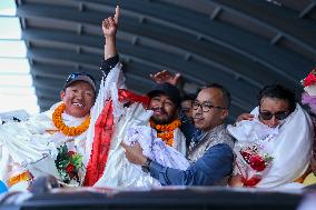 Record Holding Mountain Climbers Gets Rousing Welcome Upon Arrival Back Home