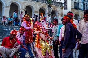 Devotees Immersing Durga Idol In Bagmati River, Nepal.