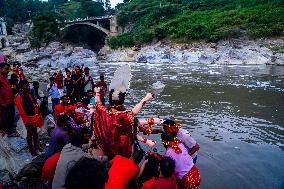 Devotees Immersing Durga Idol In Bagmati River, Nepal.