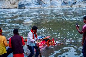 Devotees Immersing Durga Idol In Bagmati River, Nepal.