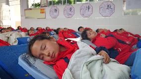 Students Nap in Enshi